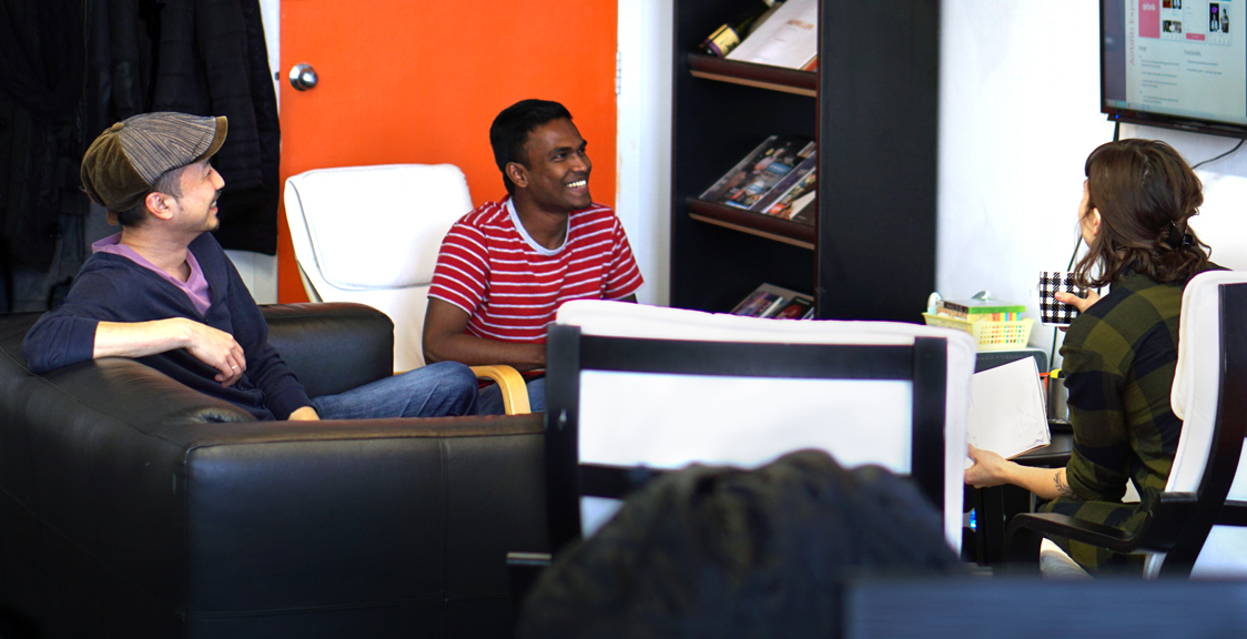 Holding three origami animal heads